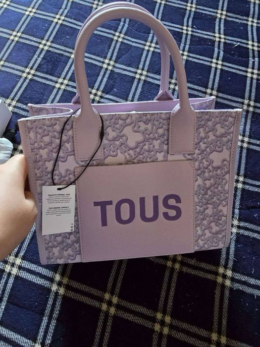 Mala da Tous original com bolsa de protecao nunca usada