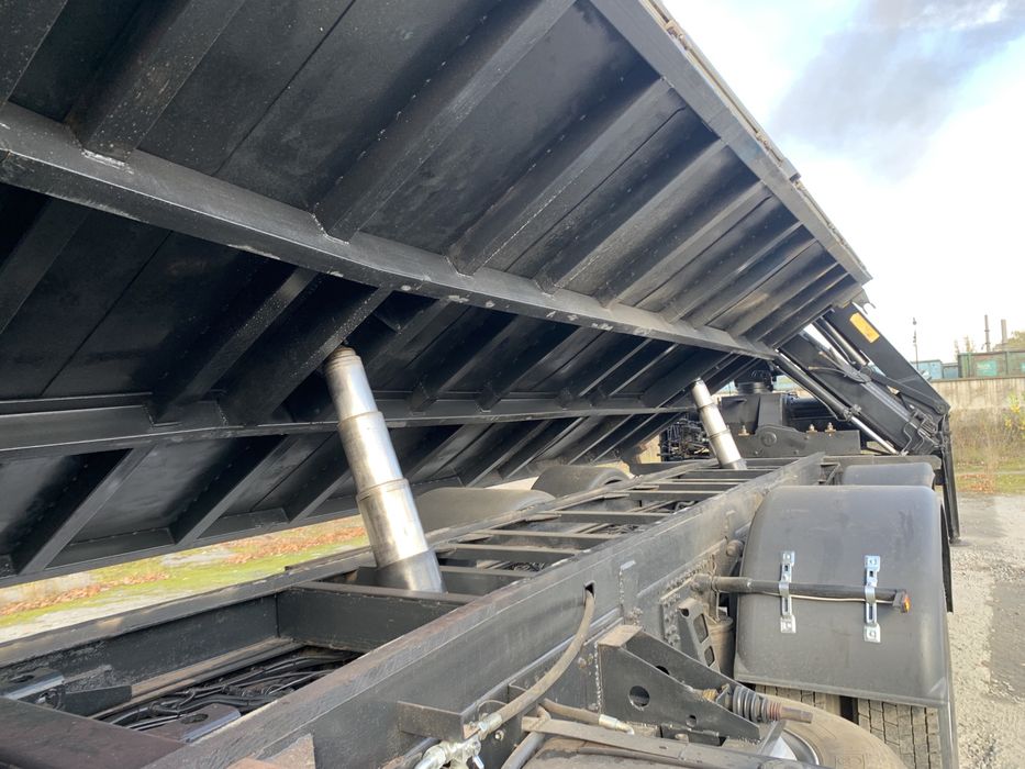 Ман самоскид з маніпулятором