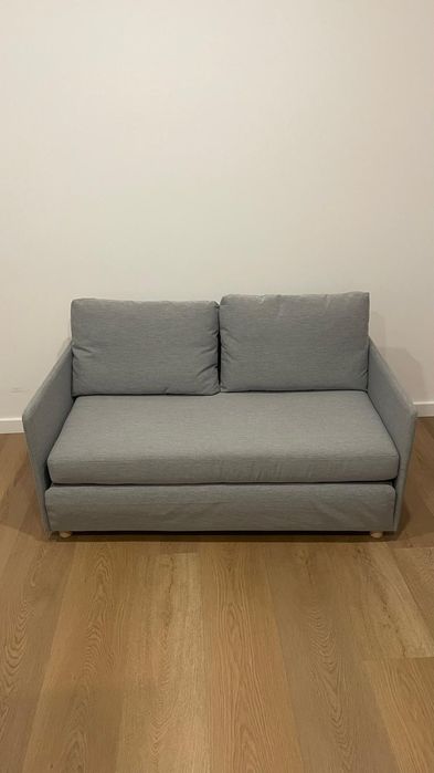 Sofá cama cinzento