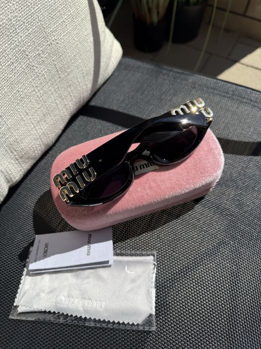 Жіночі окуляри Miu Miu