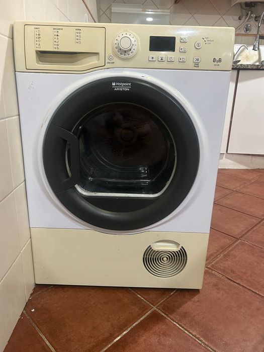 Máquina de secar avariada