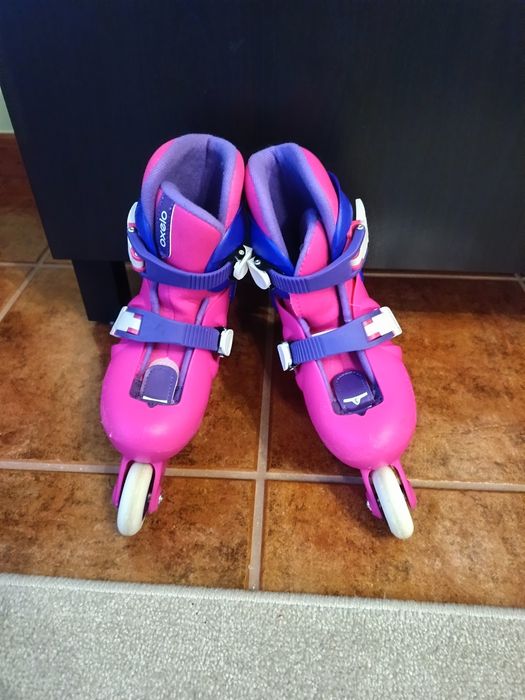 Patins em linha rosa/roxo