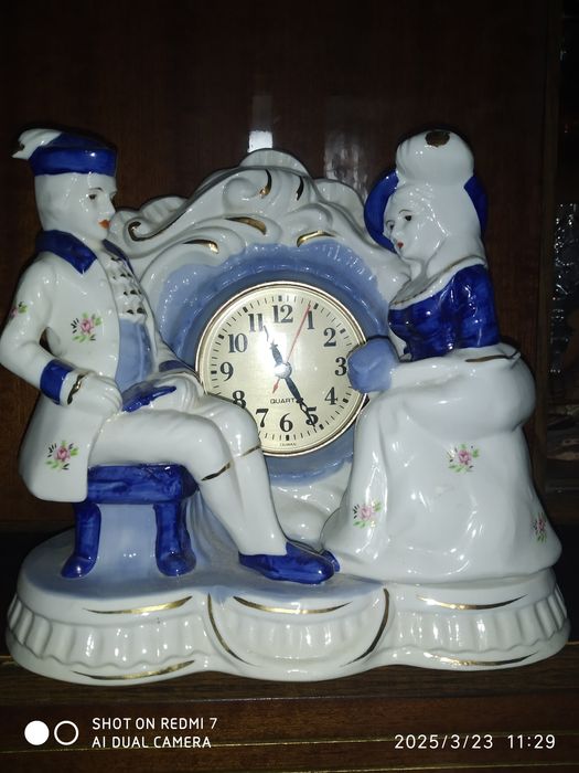 Статуэтка     Часы.