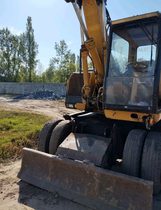 Продам екскаватор CAT