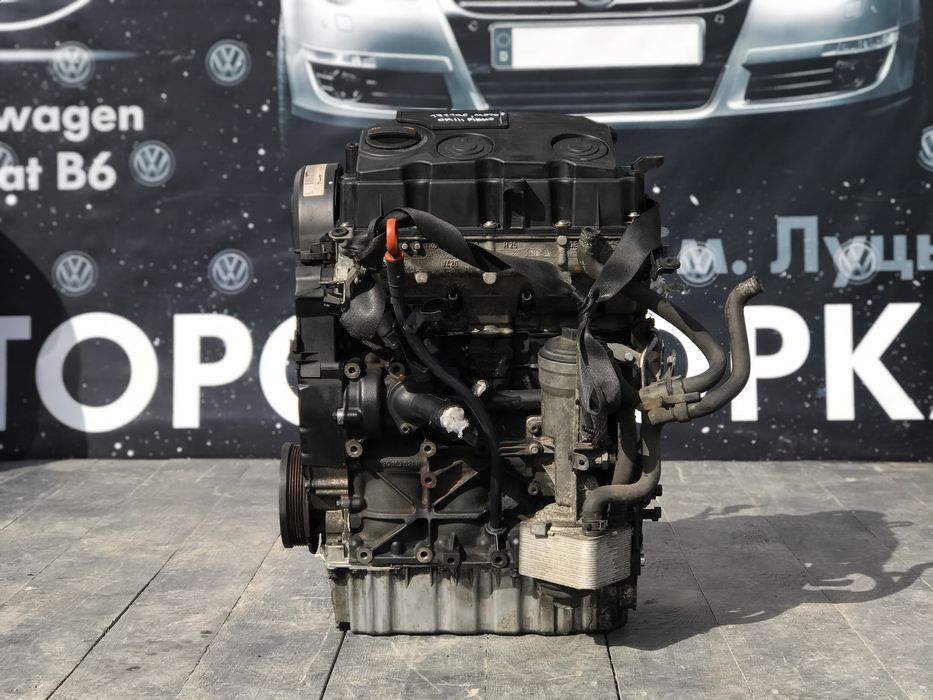 мотор двигатель 1.9 bls 77kw passat b6 golf 5 skoda a5 touran caddy