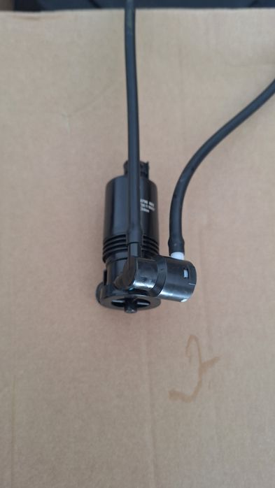 Toyota Corolla E21 18-24 pompka spryskiwaczy szyby