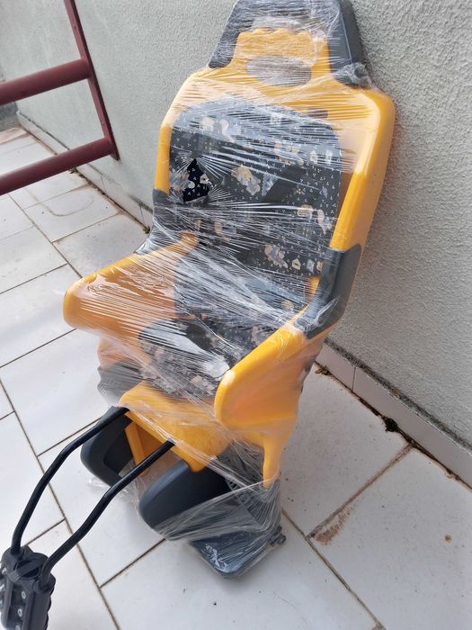 Cadeira bébe p/bicicleta completamente nova.