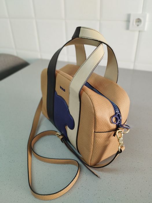 Malote da tous original em pele como nova.