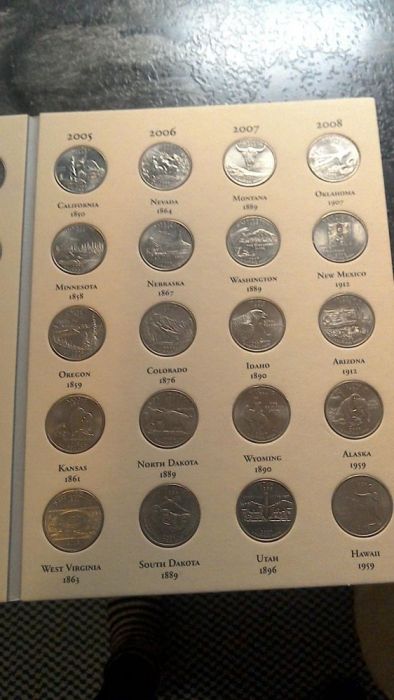 Colecção comemorativa de moedas sobre os 50 estados USA.