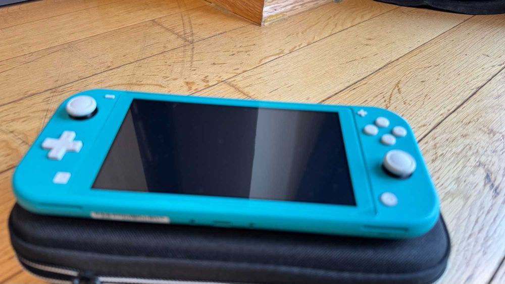 Nintendo Switch Lite Turkusowa + Minecraft, Animal Crossing, Etui