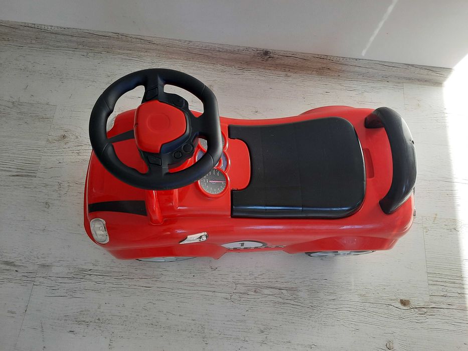 Машинка толокар з резиновими колесами майже нова