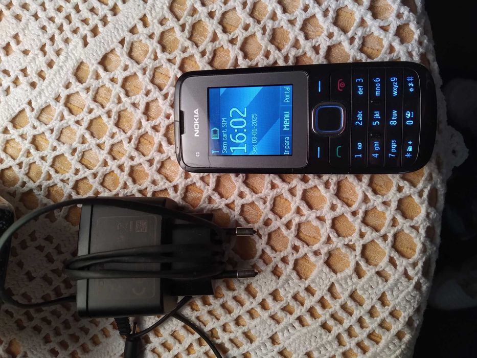Nokia c1-01, a 100% com carregador