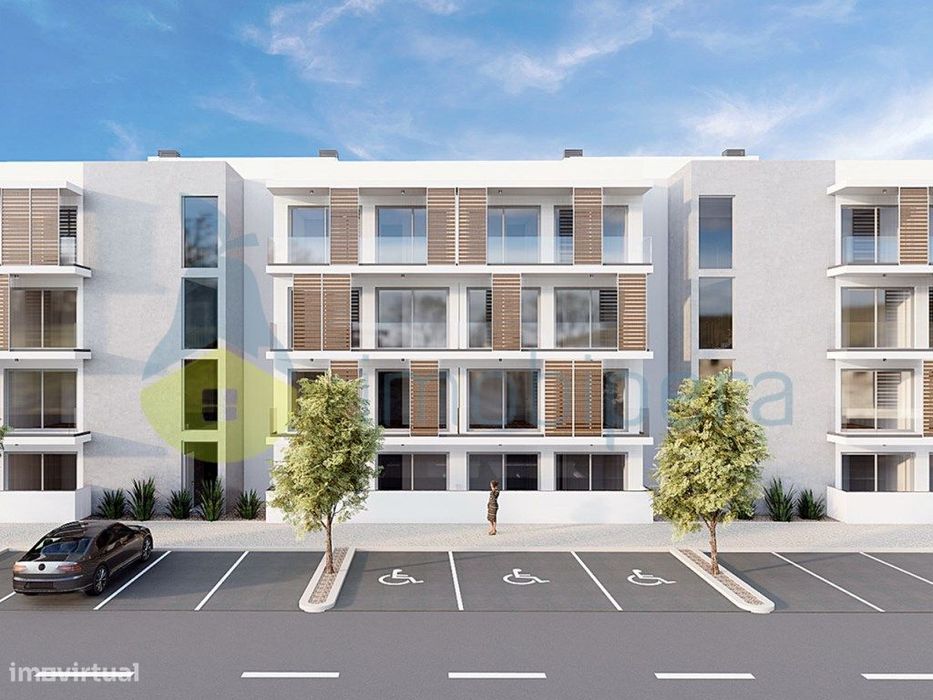 Albufeira apartamento em condomínio com piscina e jardim.