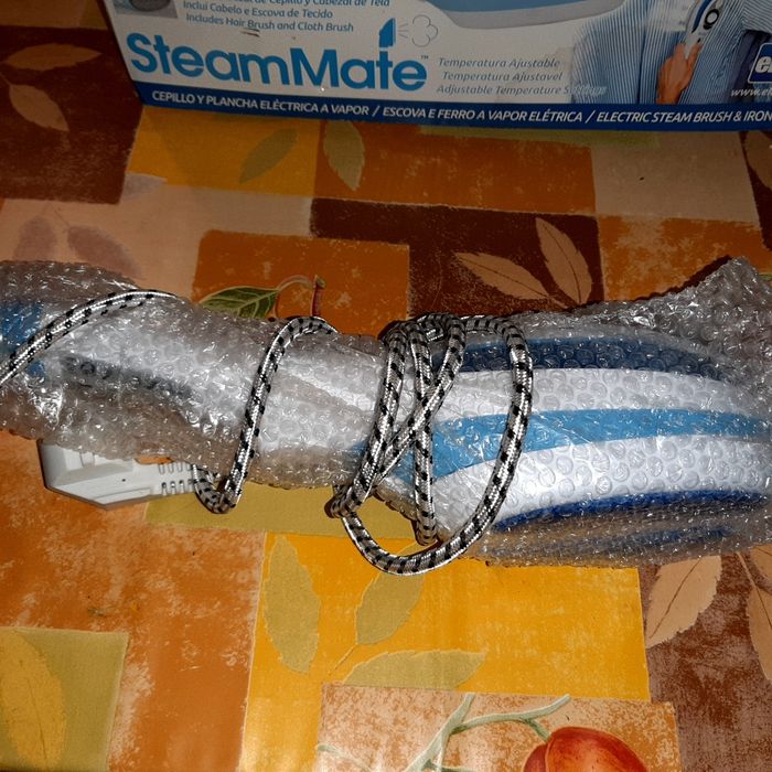 Escova e ferro a vapor