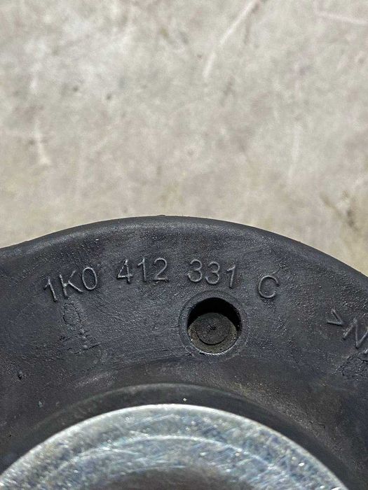 Опора переднього амортизатора VW Passat B7 1K0412331C