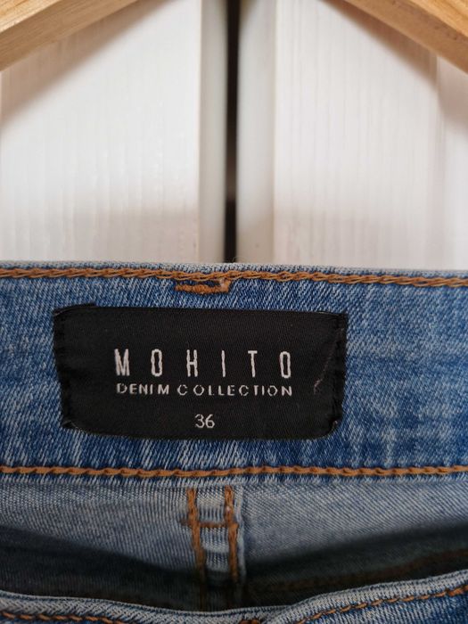 używane spodnie jeansy, dopasowuje się do sylwetki,