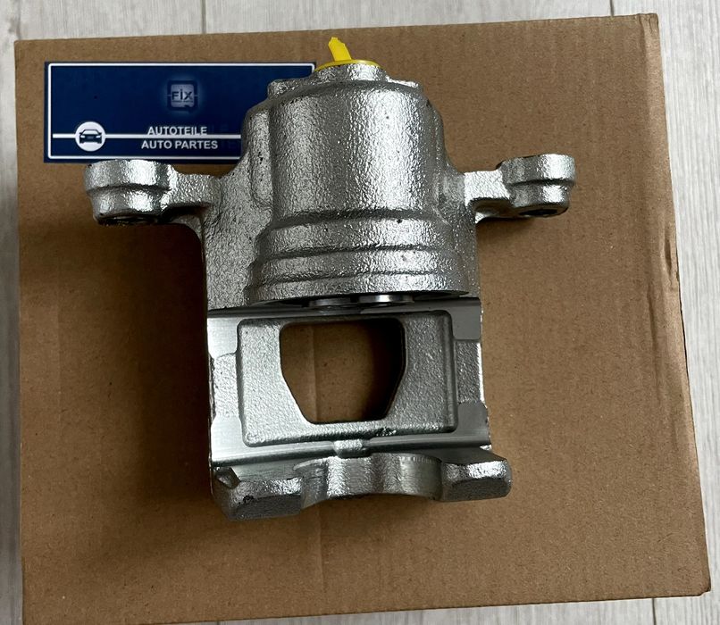 Супорт Ніссан задній. Лівий правий.