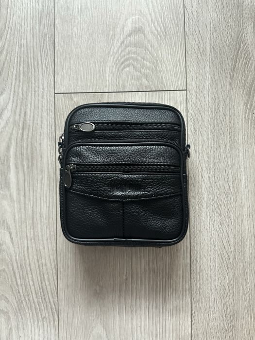 Saszetka skórzana kolor czarny