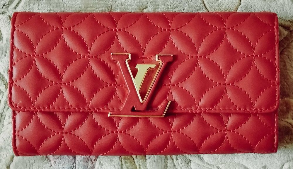 Жіночий довгий гаманець Louis Vuitton Portefeuille Capucines зі шкіри  червоного кольору