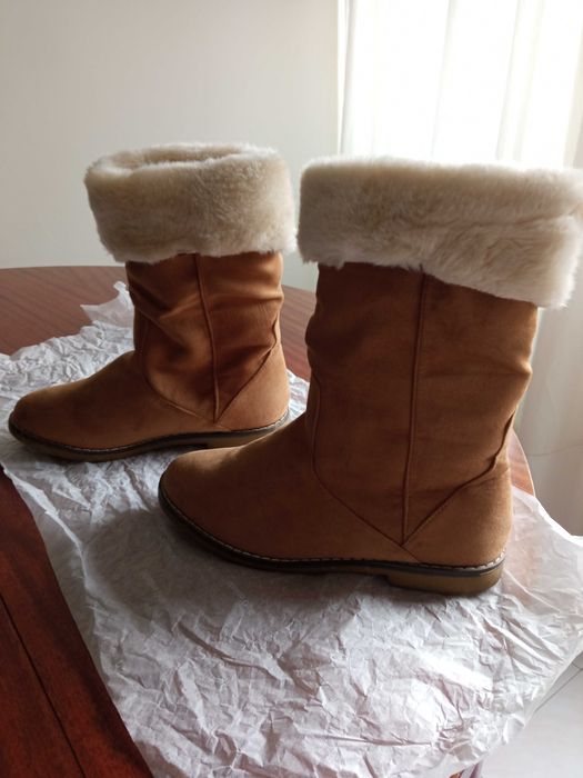 Botas cano alto com pelo no interior