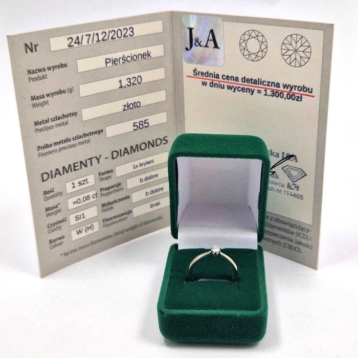 Złoty pierścionek z brylantem 0,08ct 585 r7 1,32g