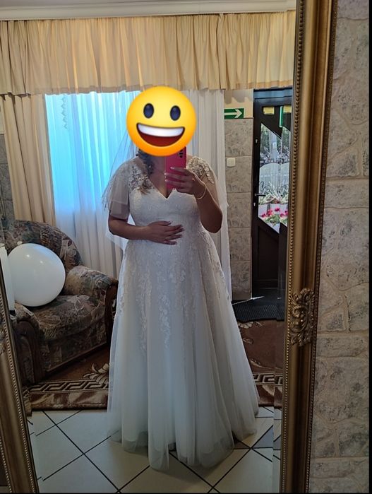 Sukienka ślubna z welonem