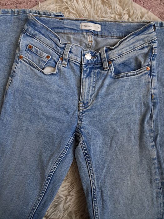 Dzwony jasnoniebieskie jeansowe Ginatricot XS wysoki stan