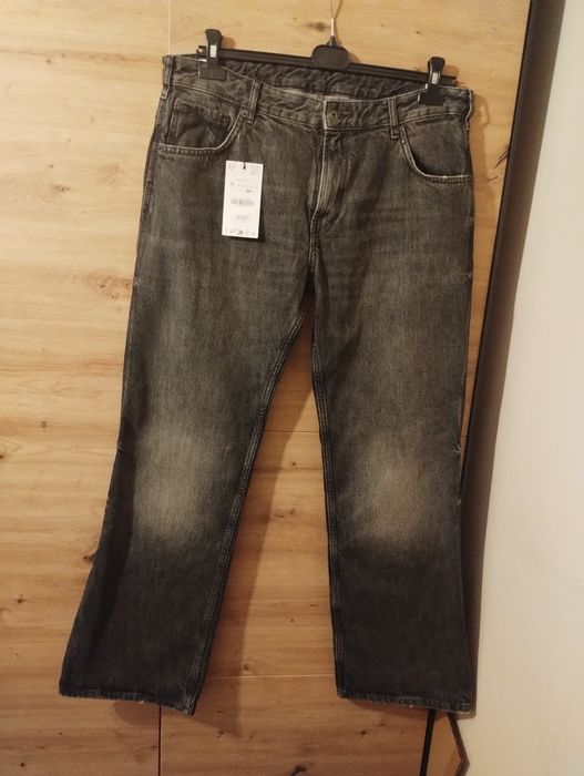 Męskie czarne spodnie jeansowe flare Zara r.44