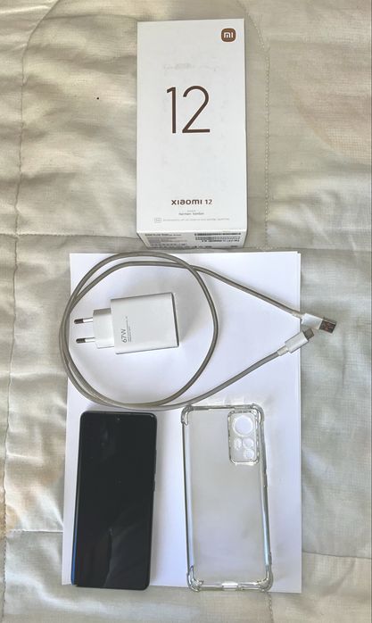 Xiaomi Redmi Note 12 128gb W/ Charger and cell phone cover