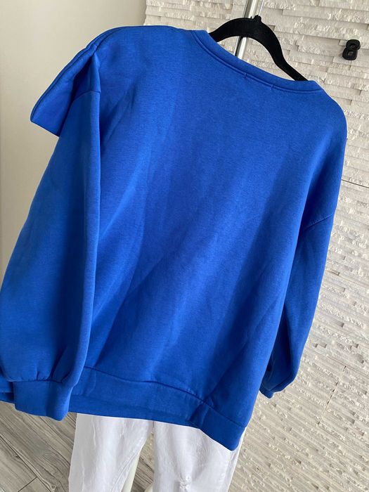 Azara mięsista bluza z dużą kokardą 3D chabrowa