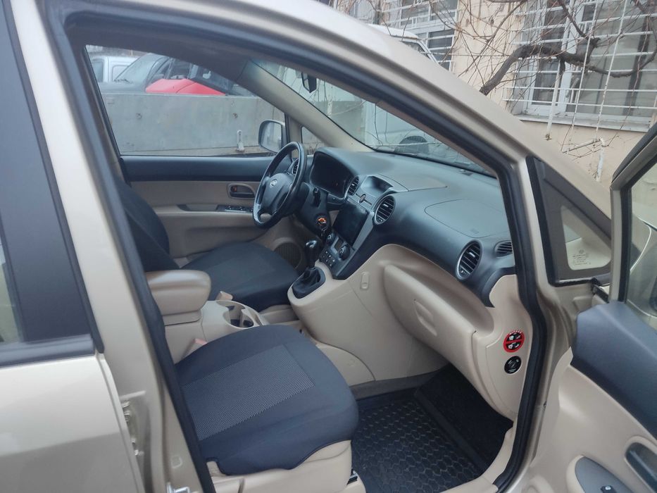 Продам KIA Carens