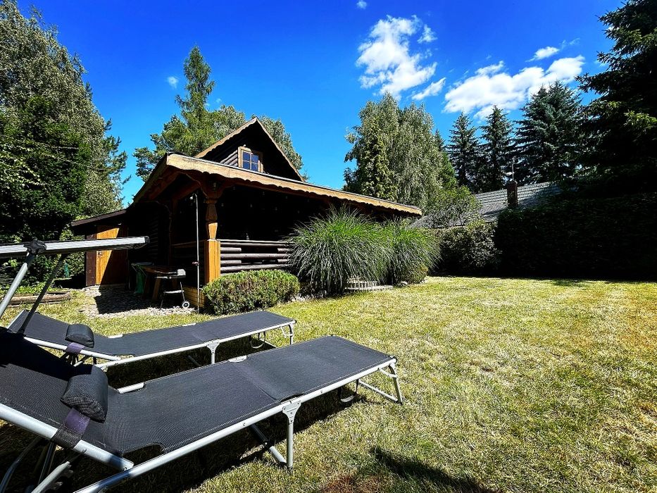 Domek nad Jeziorem Piaseczno Chata Soła, kominek taras