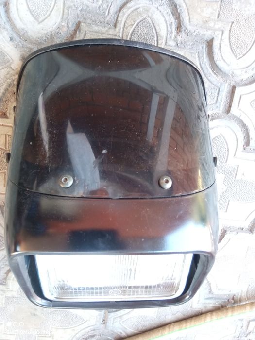 Фара от мотоцикла с защитой от