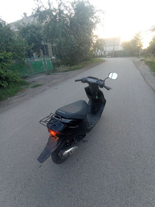 Продам скутер хонда дио, шлем, і телефон