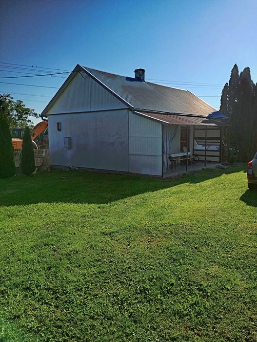 Działka budowlana z zabudowaniami