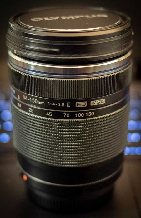 Захищений Olympus M.Zuiko 14-150 2 II 4-5.6 Panasonic 25 1.8 micro 4\3