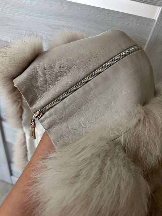 Продам мехову желетку