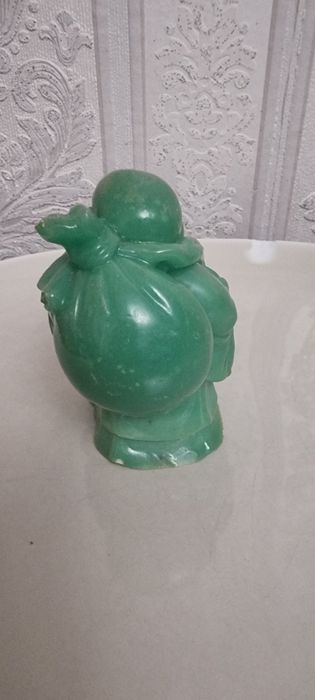 Статуетка Будди .