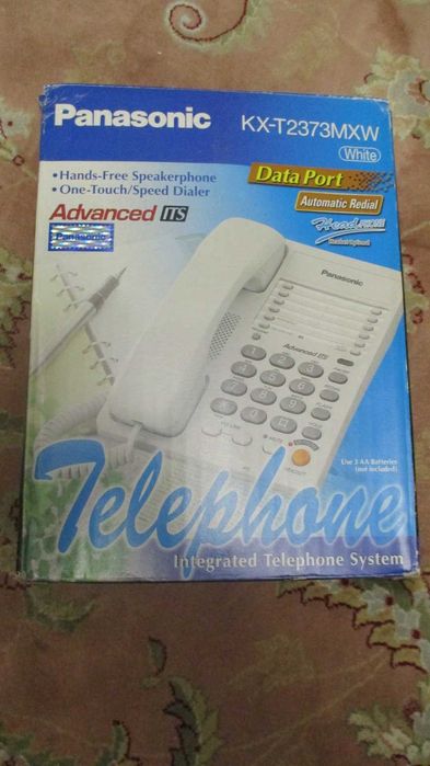 Стационарные телефоны Panasonic KX-T2373MXW и Casio