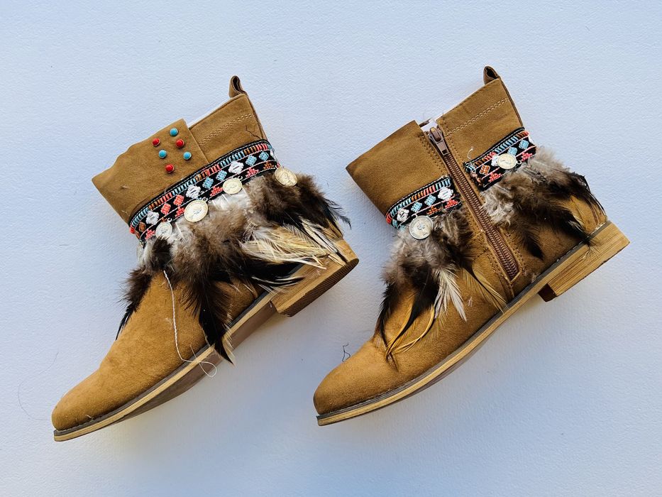 Feather-Adorned Leather Boots
