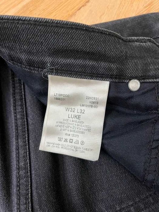 Spodnie jeansy Lee M 32/32