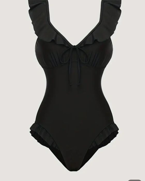 Новый слитный цельный куальник. Черный купальник с рюшами. Размер 48.