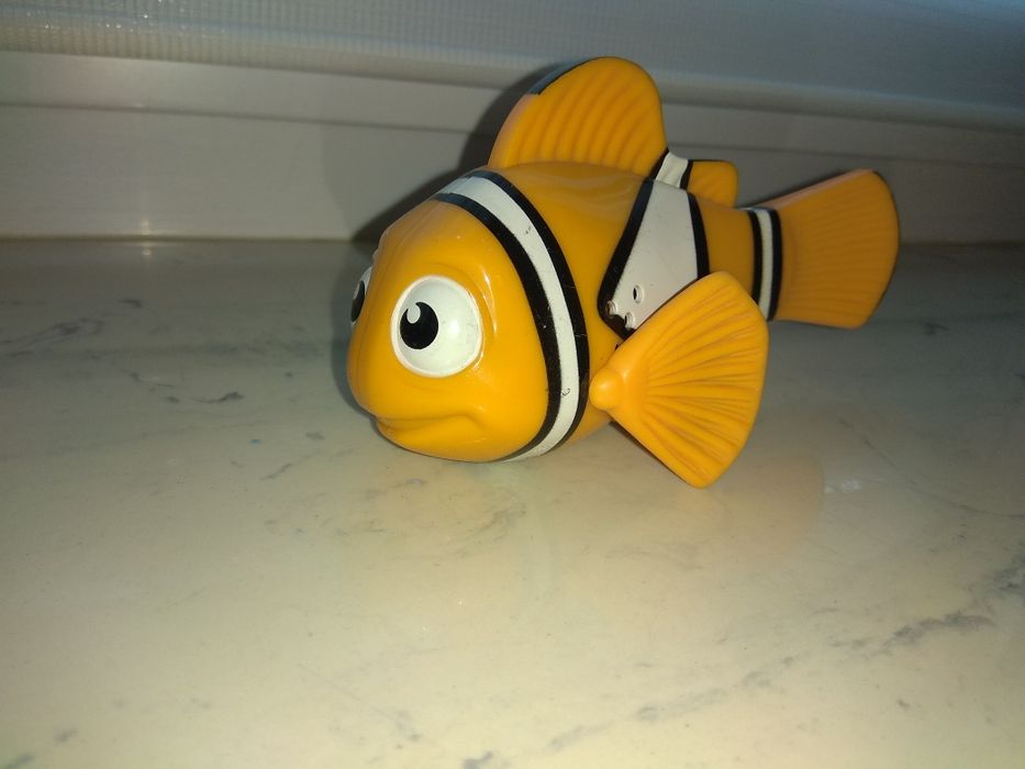 Zabawki dinozaury + Nemo