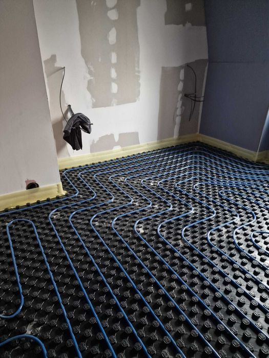 Wylewki anhydytowe,posadzki anhydrytowa,styrobeton,płynny styropian, ogrzewanie podłogowe,instalacja WOD-KAN