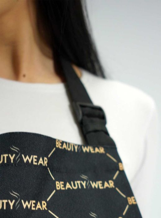 Fartuszek czarno złoty logo BeautyWear kobiecy prezent wodoodporny