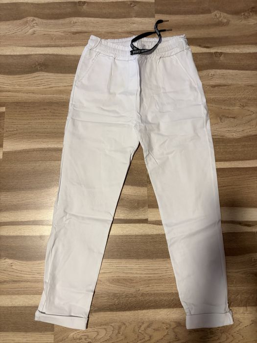 Białe lekkie spodnie L/ XL