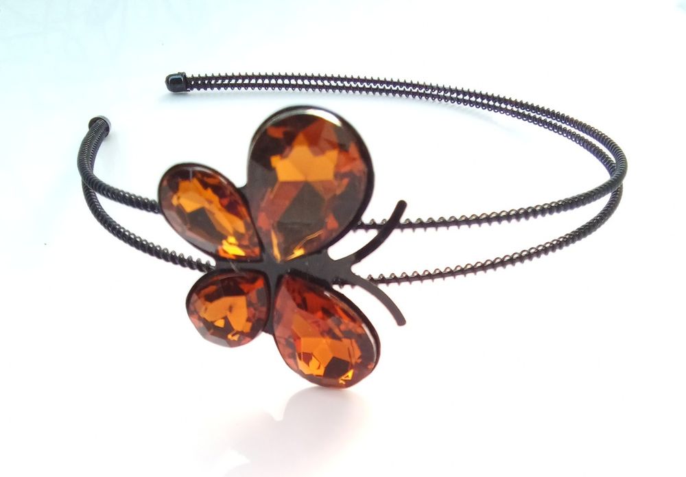 Opaska metalowa z cyrkoniowym motylkiem