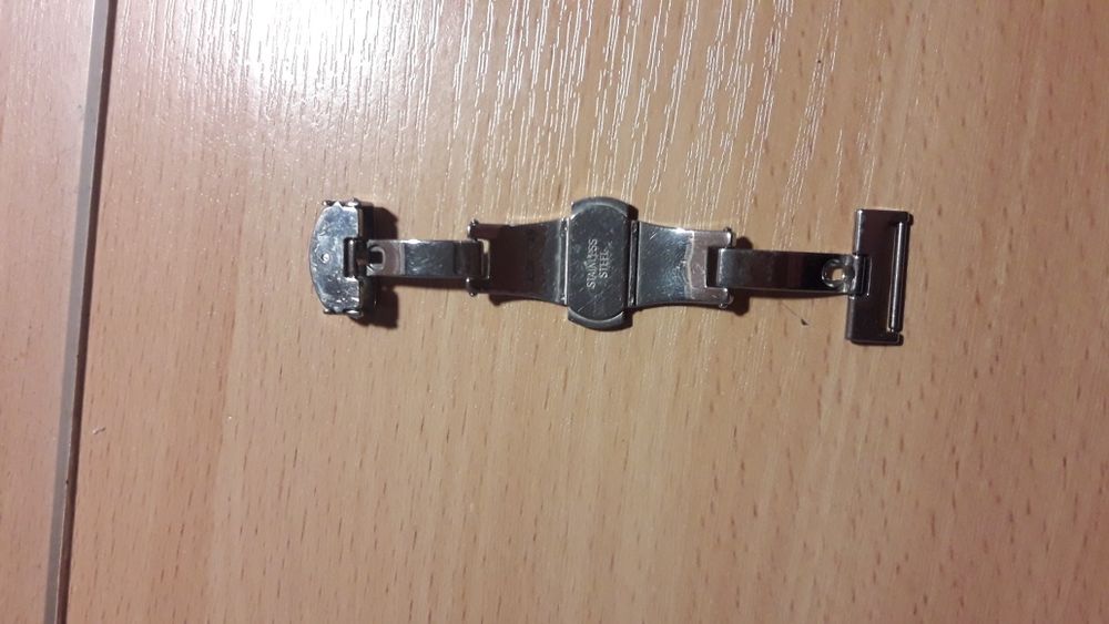 Пряжка метелик подвійна, бакля, кліпса.