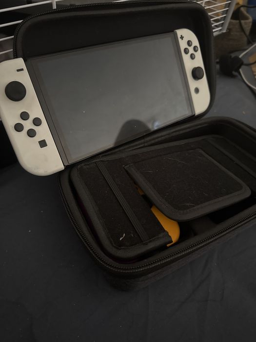 Nintendo Switch OLED biały + gry + joycony+karta 128 GB+dock