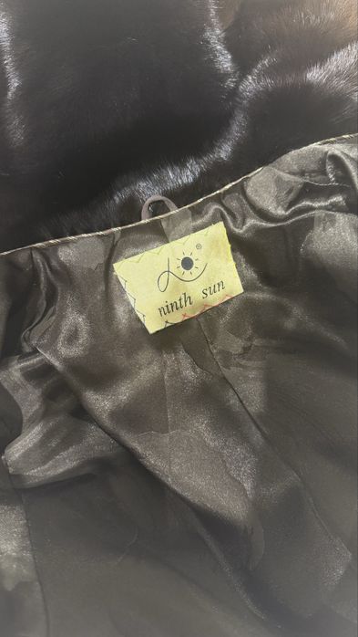 Жіноча норкова шуба